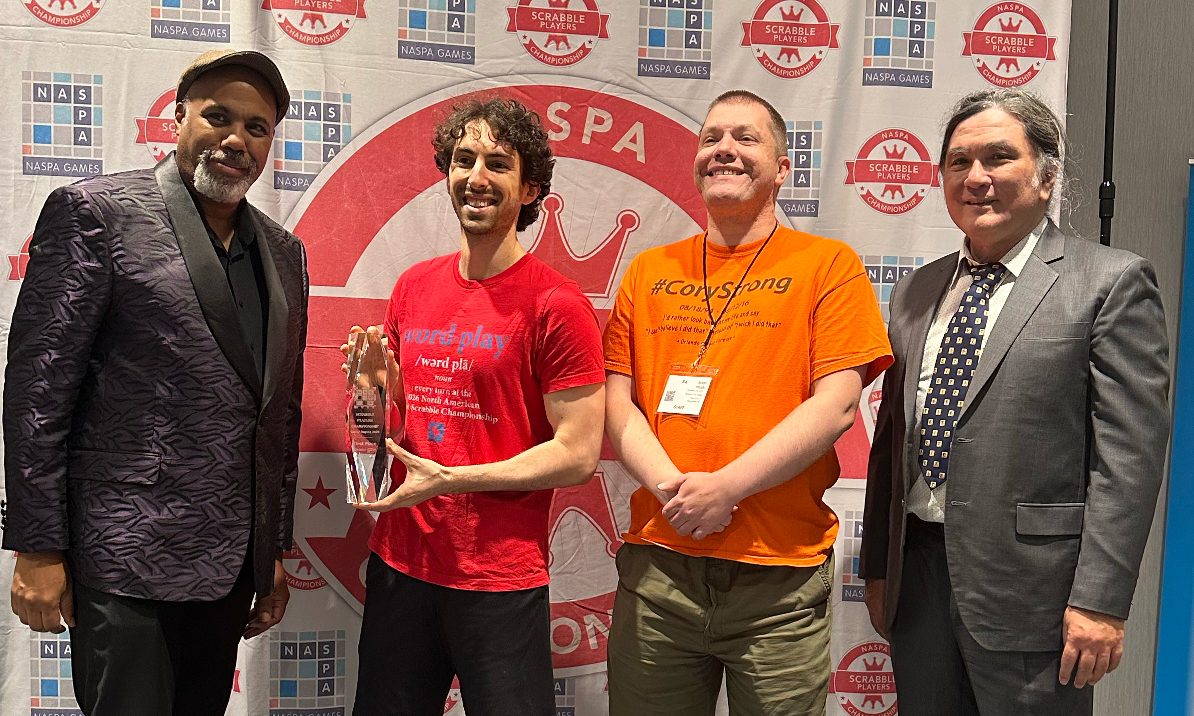 Photo of Scrabble Players Champion Mack Meller with presentation check